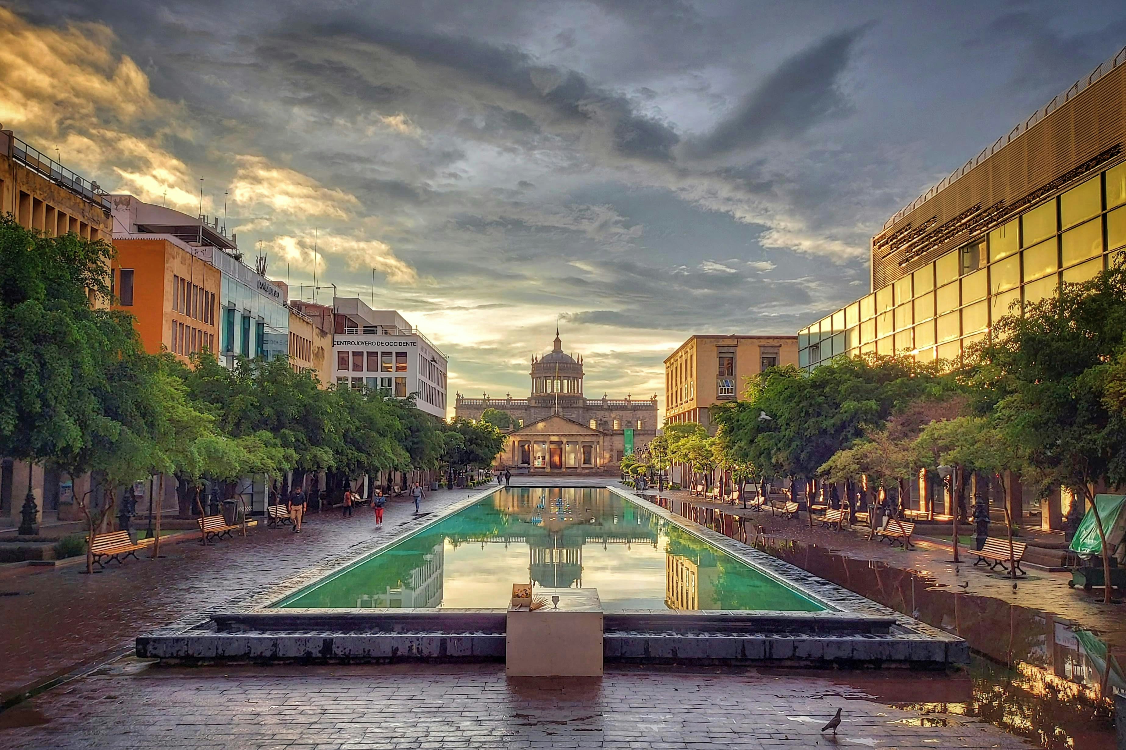 The Plaza de la Liberación at dusk in Guadalajara, Jalisco, looking toward the Hospicio Cabañas